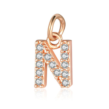 26 rose gold English letter copper zircon pendants.