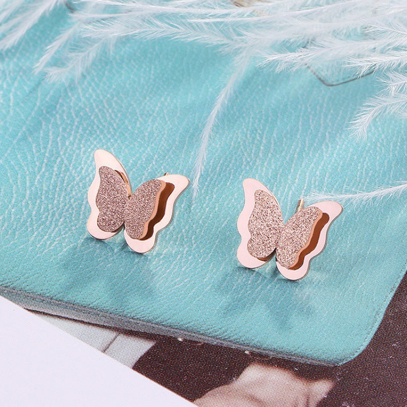 Frosted butterfly stud earrings