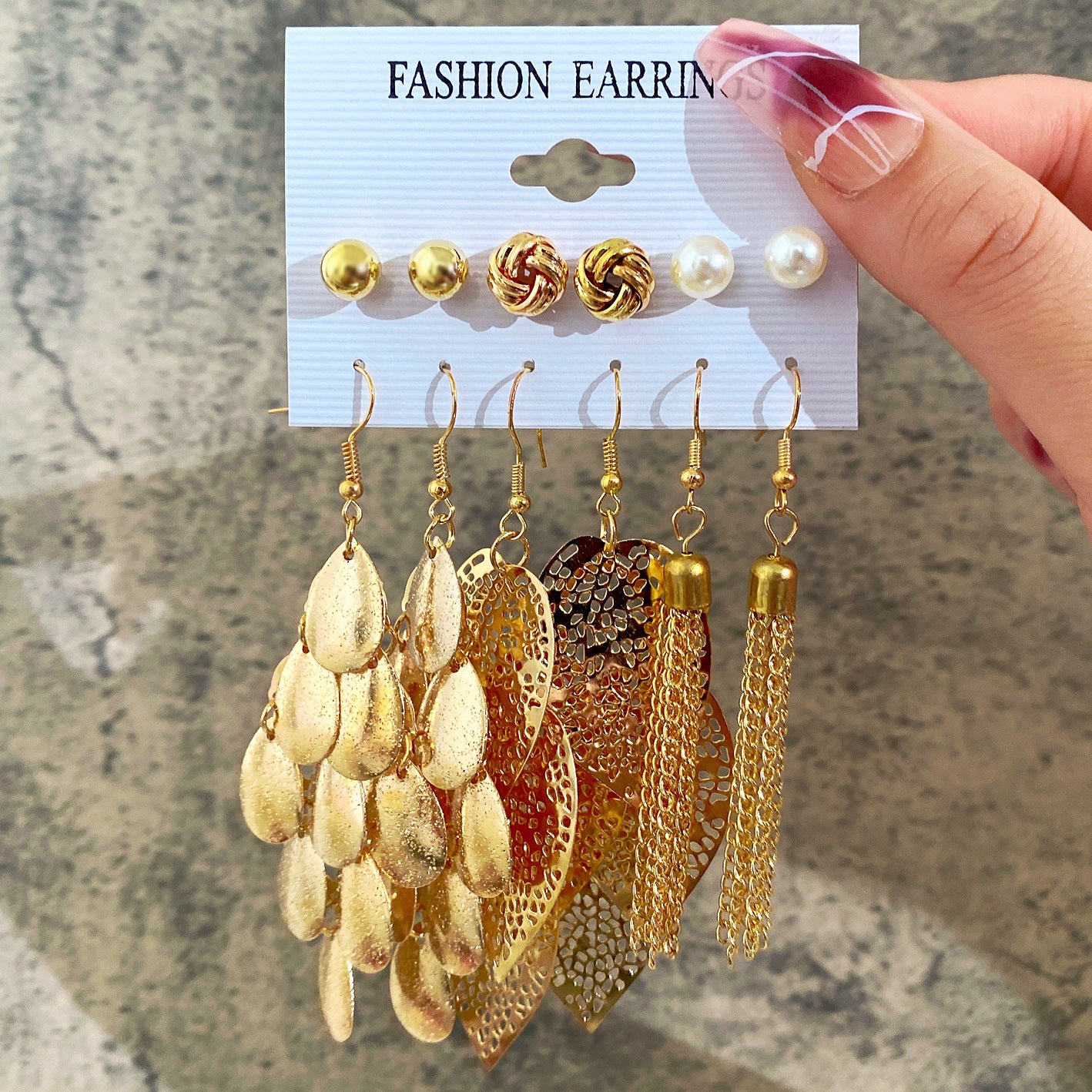 6 pairs of pearl earrings set with leaf weaving