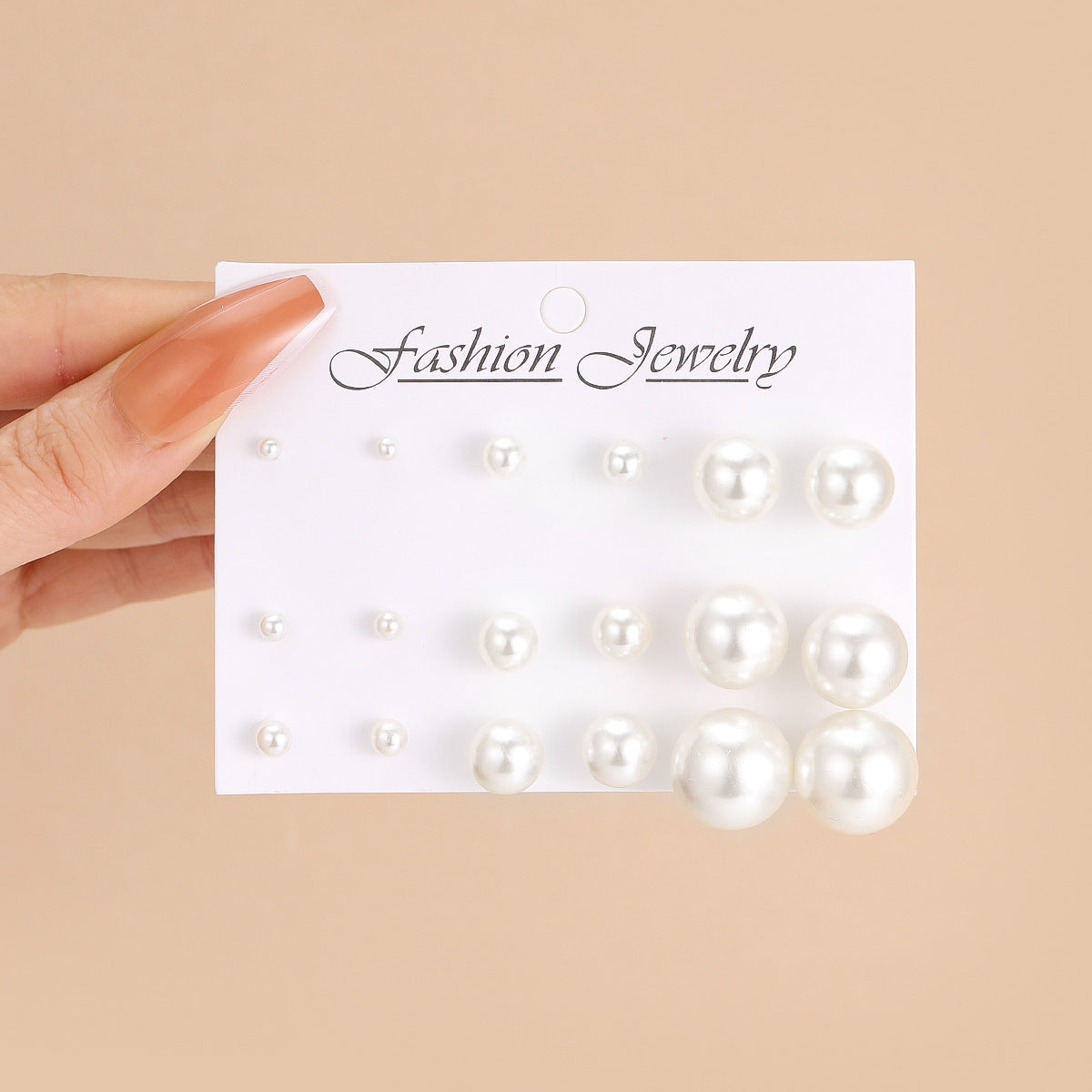 Set of 12 pairs of imitation pearl earrings