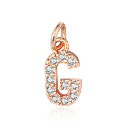 26 rose gold English letter copper zircon pendants.