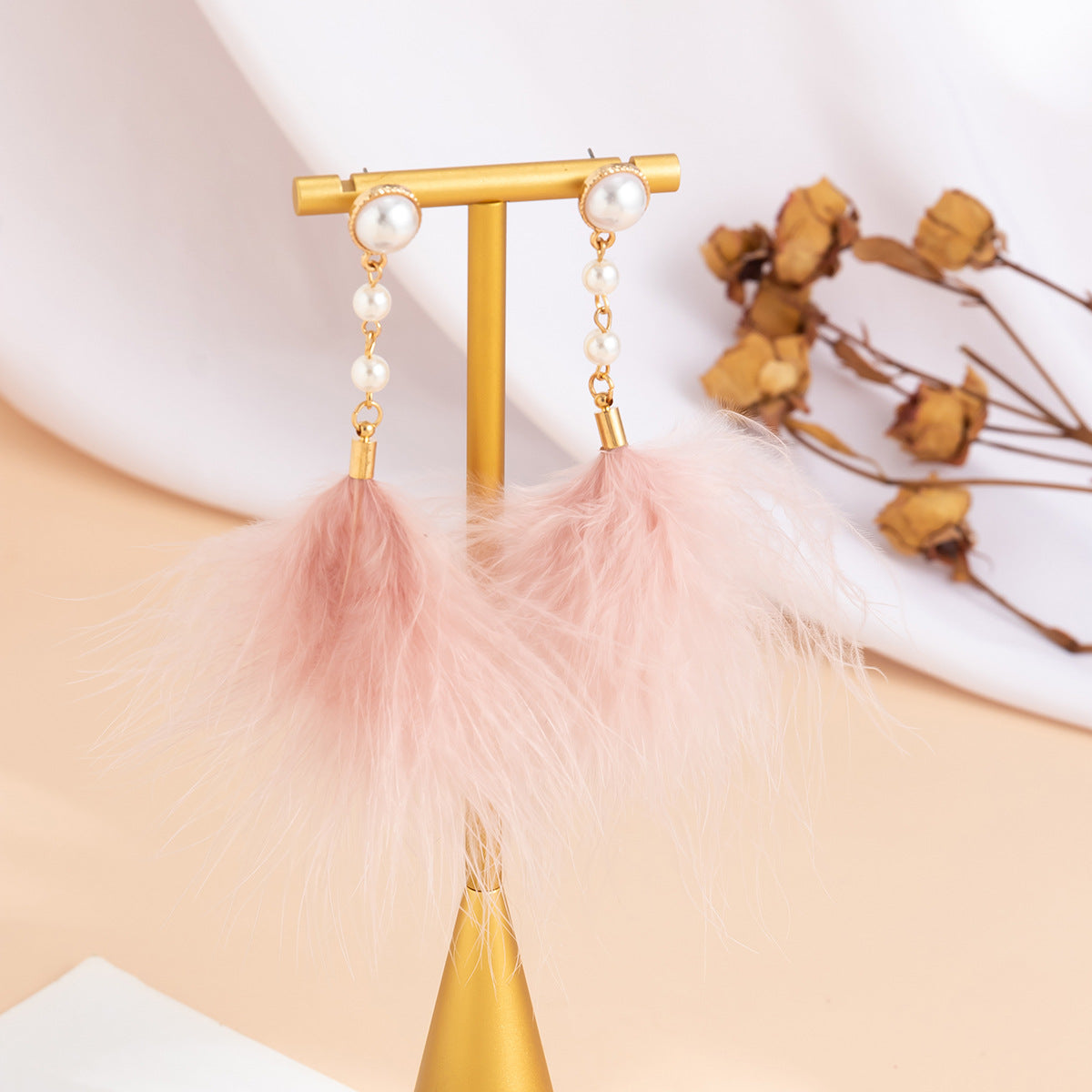 Feather fringed imitation pearl earrings