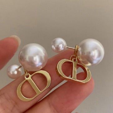 Pearl earrings, two pearl stud earrings before and after.