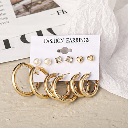 Metal C-shaped earrings set 6 pieces