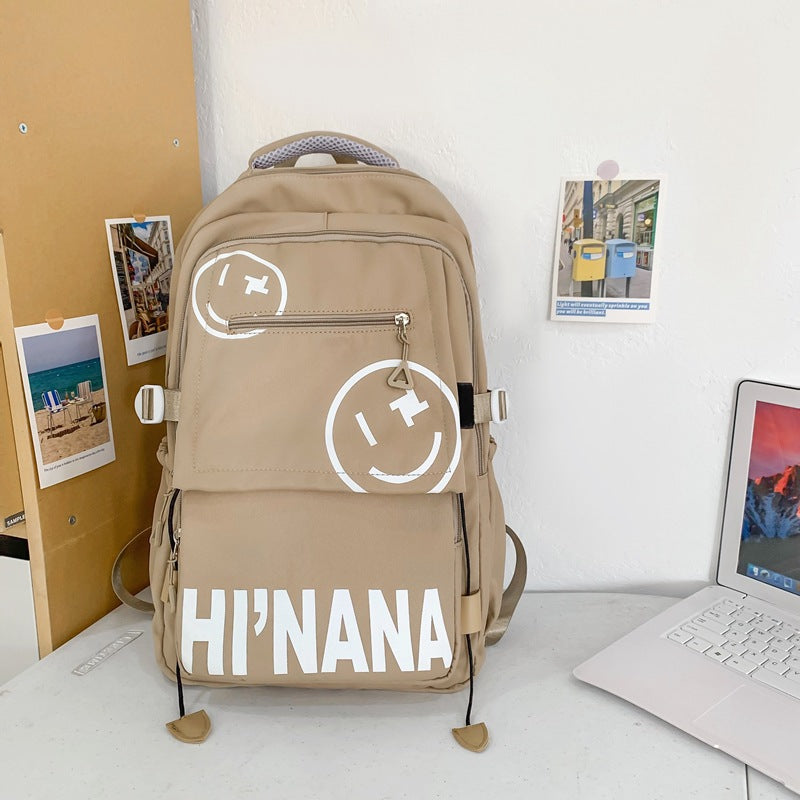 Backpack with smiley face print