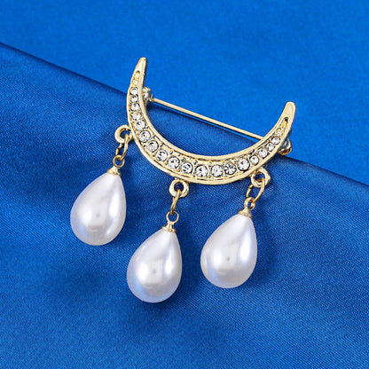 Bow pearl brooch