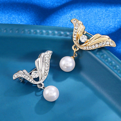 Bow pearl brooch