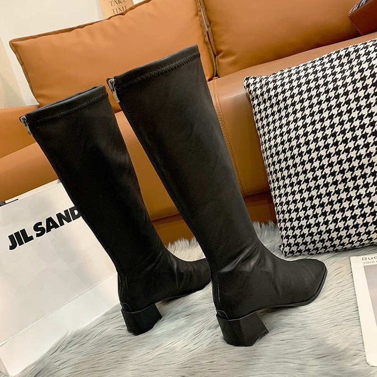 Black and white high boots for women