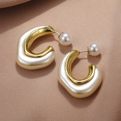 C-shaped pearl earrings