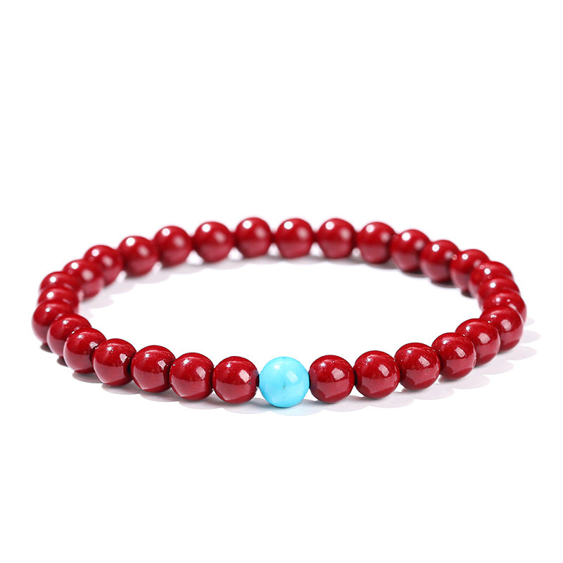 Cinnabar bead bracelet.