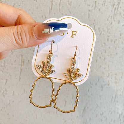 Gold hollow pineapple earrings