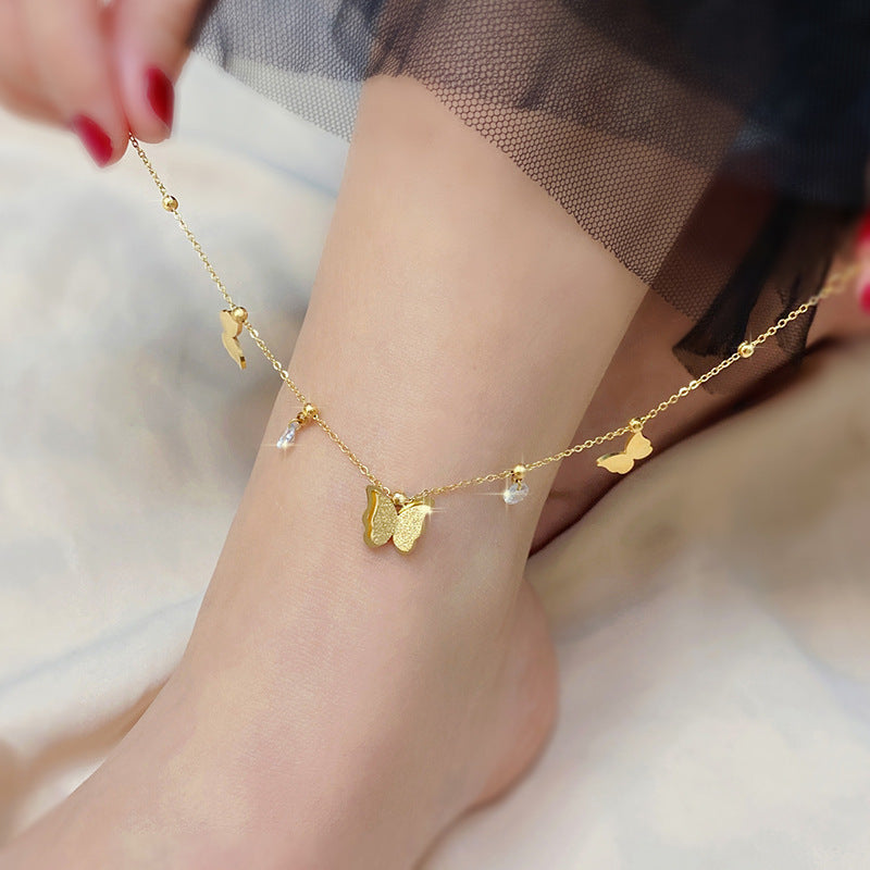 Golden butterfly anklet woman