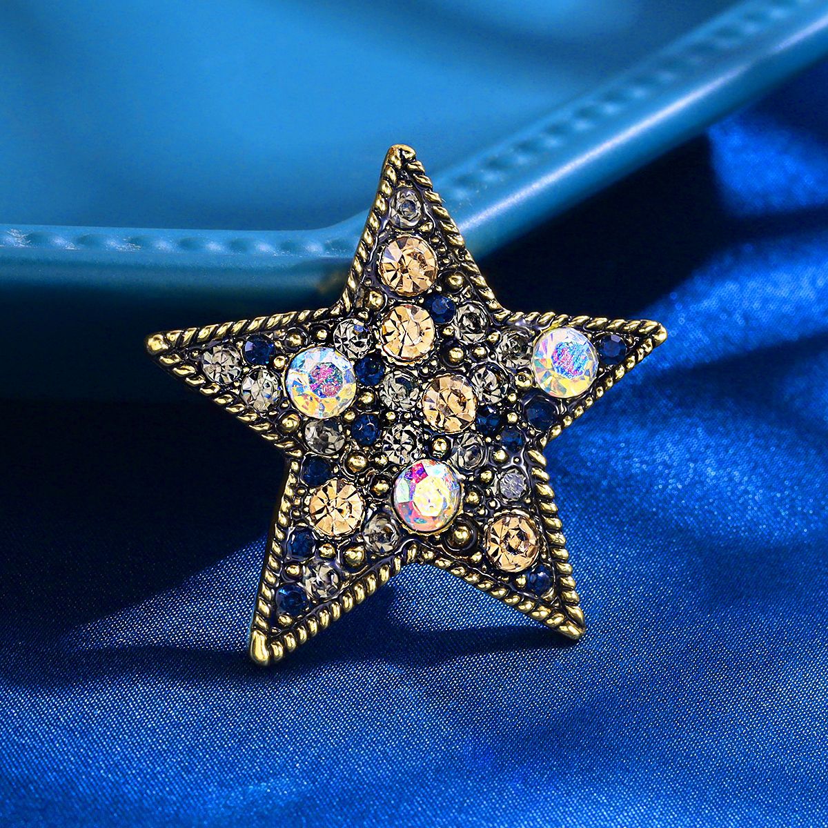 Pentagram brooch with diamonds