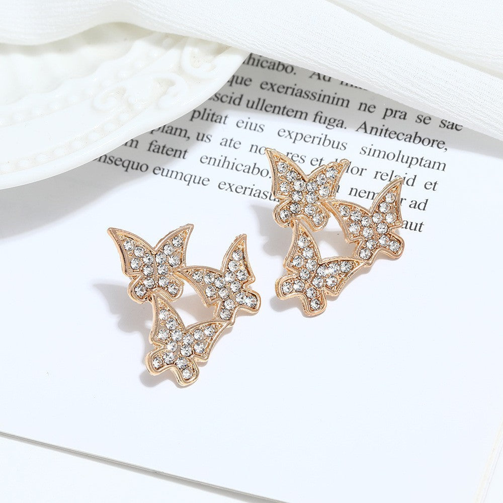 Pendientes de mariposa con forma de diamante 