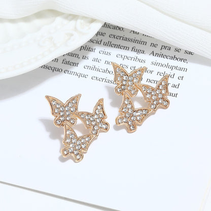 Pendientes de mariposa con forma de diamante 