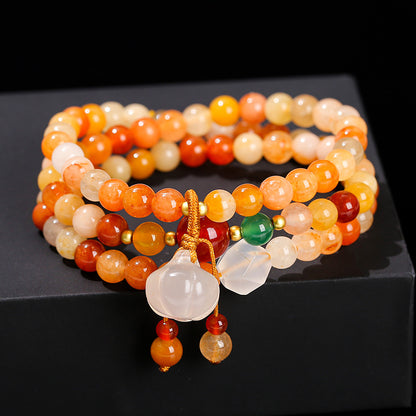 Golden silk jade multi-ring bracelet