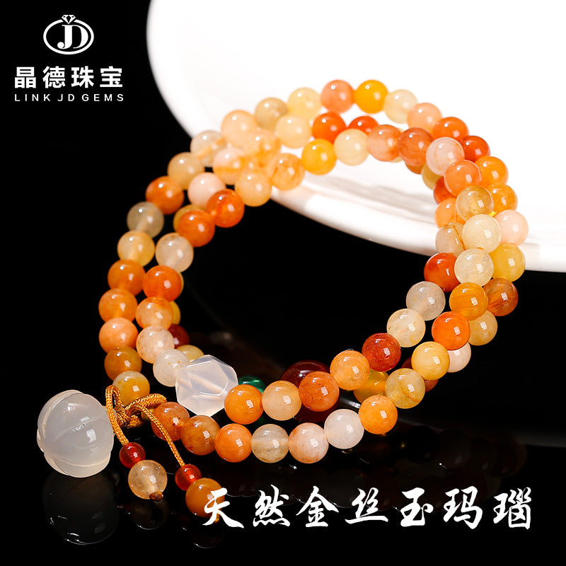 Golden silk jade multi-ring bracelet