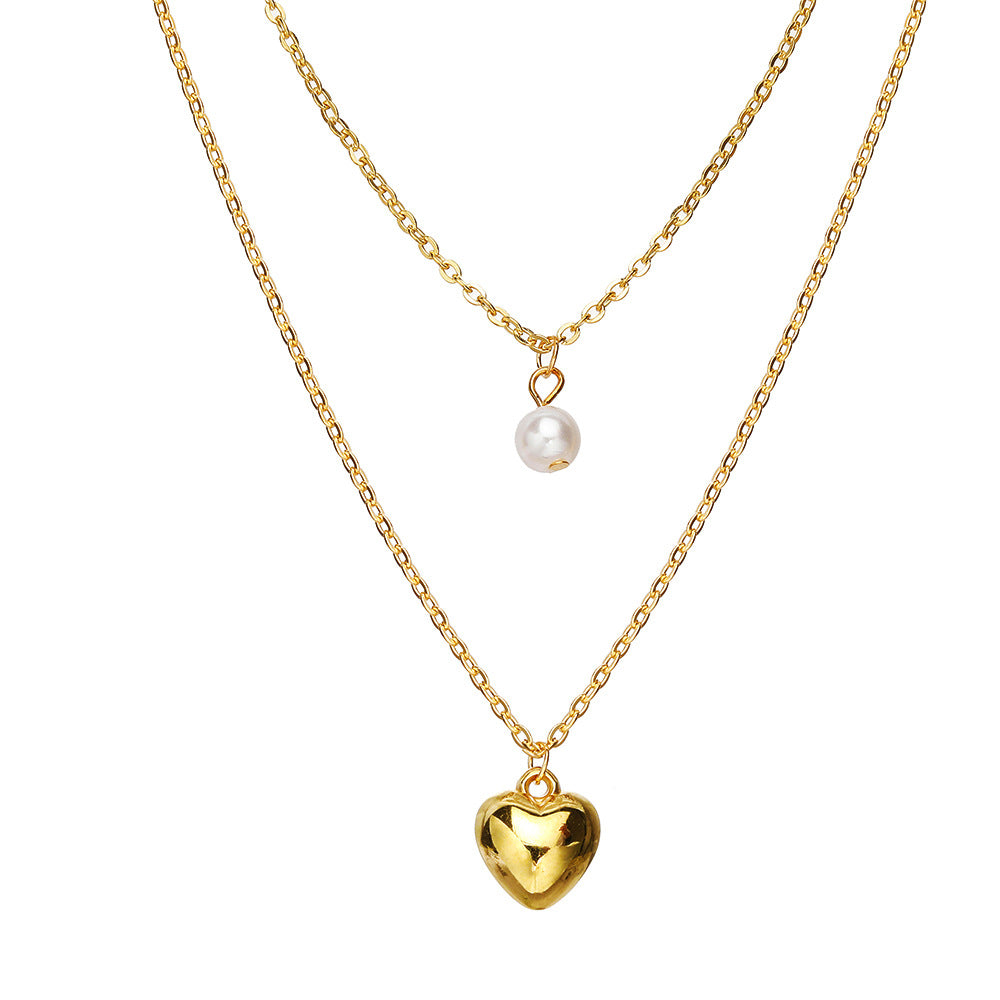 Multi-layered pearl heart necklace