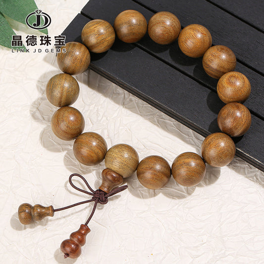 Green sandalwood bead bracelet.