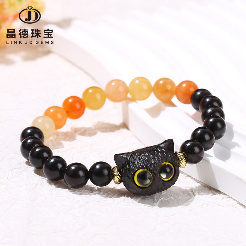 Natural red Dongling spell ebony cat head bracelet.