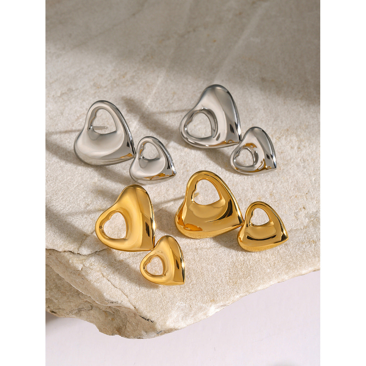 Double-layer heart hollow earrings