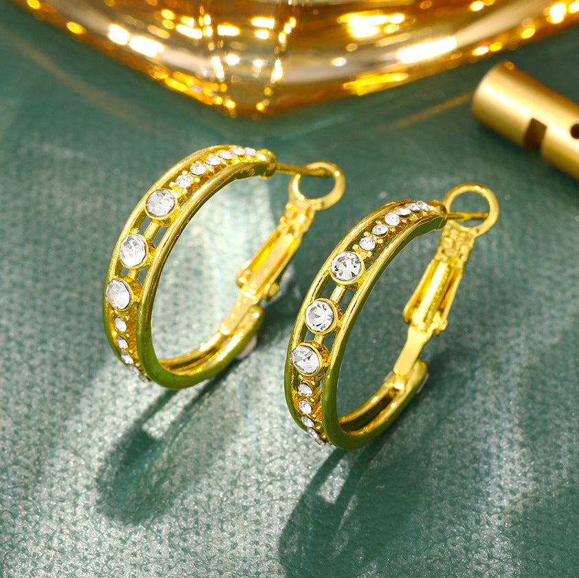 Women's C-shaped earrings with rhinestones