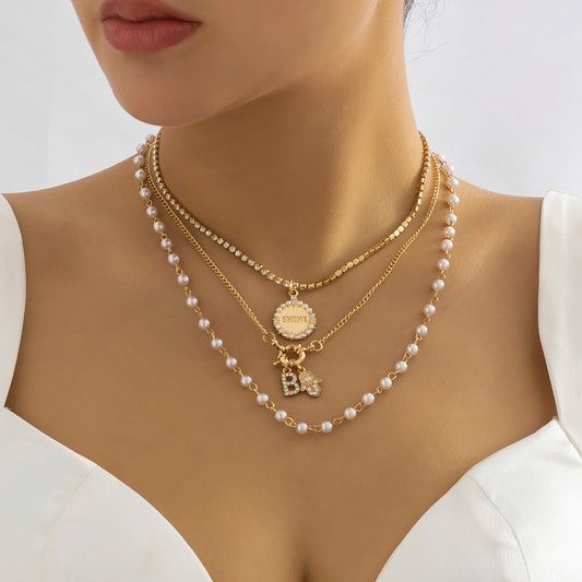 Pearl chain rhinestone letter necklace