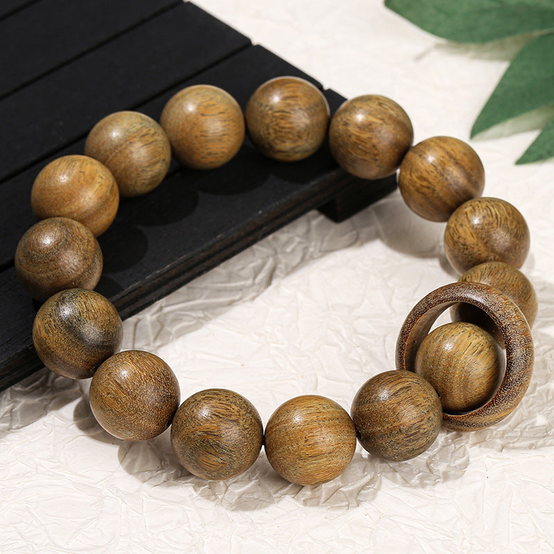 Green sandalwood running ring bracelet.