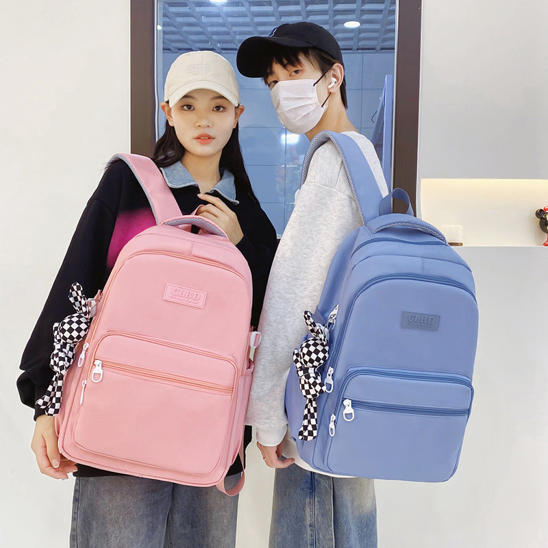 Men's and women's solid color leisure travel backpack wholesale