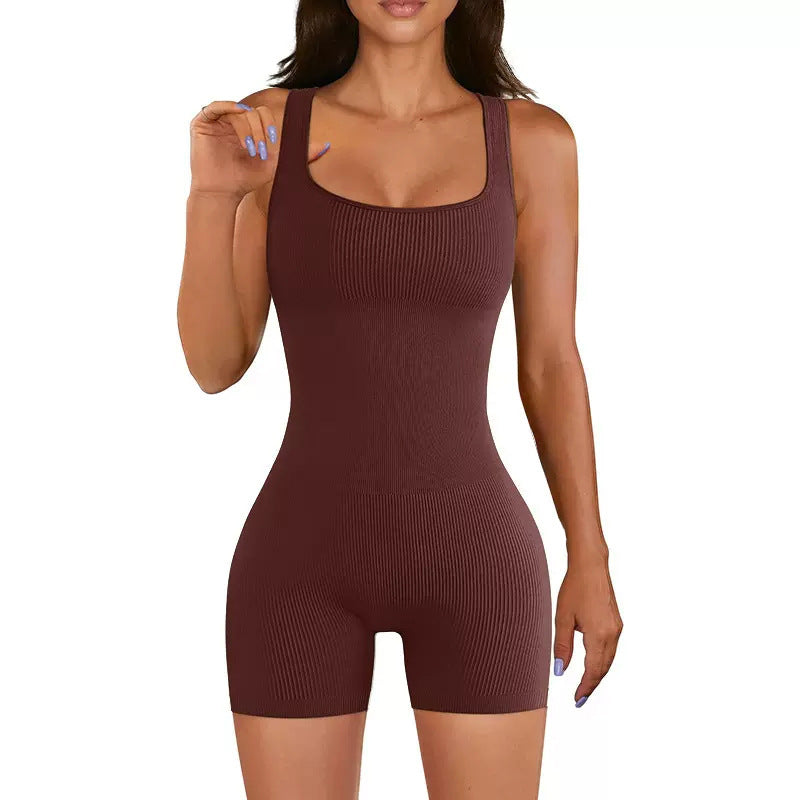 One-piece fitness suit with open back, hip lift and thin fitness shorts