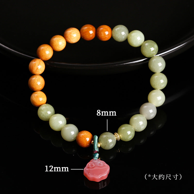 Natural sapphire round bead sandalwood bracelet.