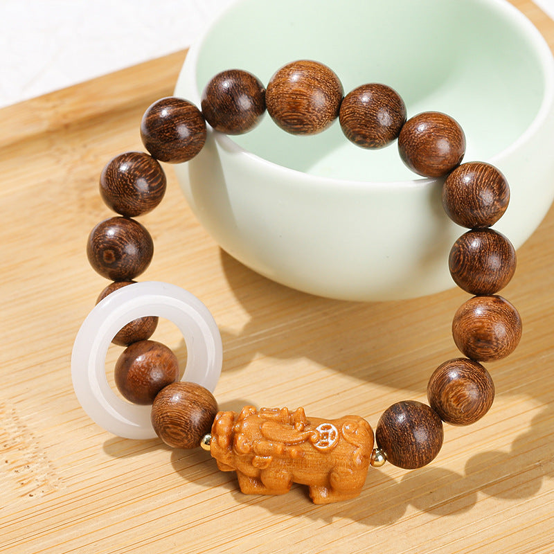 Golden sandalwood imitation white jade running ring bracelet.