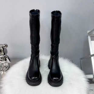 Long thick-soled boots for women