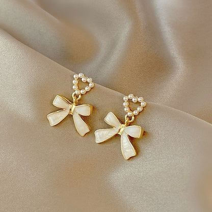 Bow drip earrings