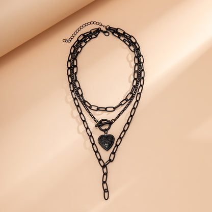 Black chain stacked with love necklace