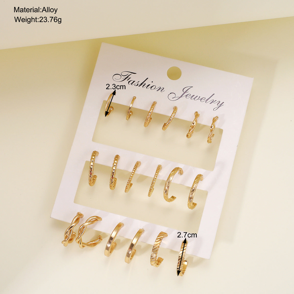 Gold twist earrings set 9 pieces