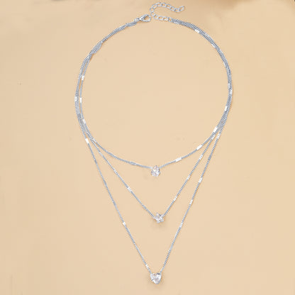 Multi-layered star heart necklace