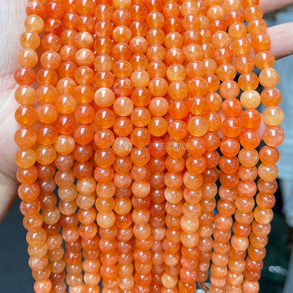 Perlas sueltas de calcedonia naranja optimizada de Xinjiang 