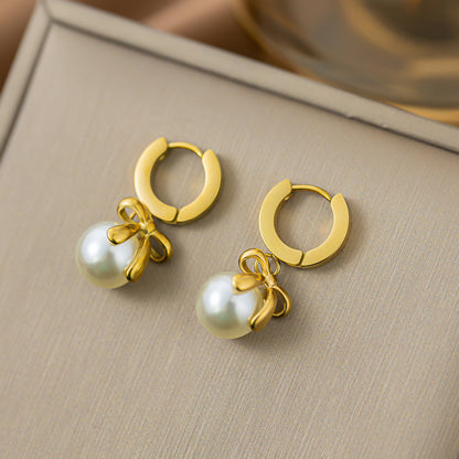 French bow pearl earrings