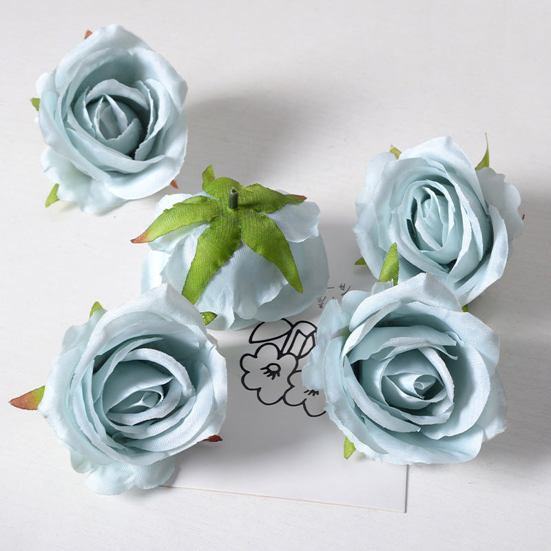 Artificial rose flower head