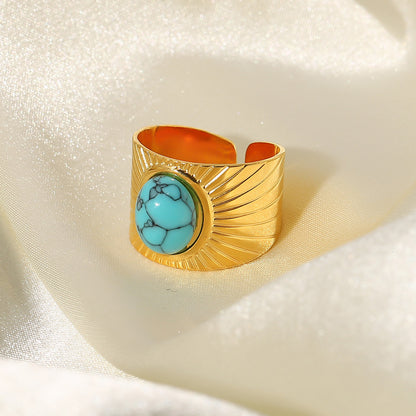 Anillo ajustable abierto con logotipo en espiral de color turquesa 