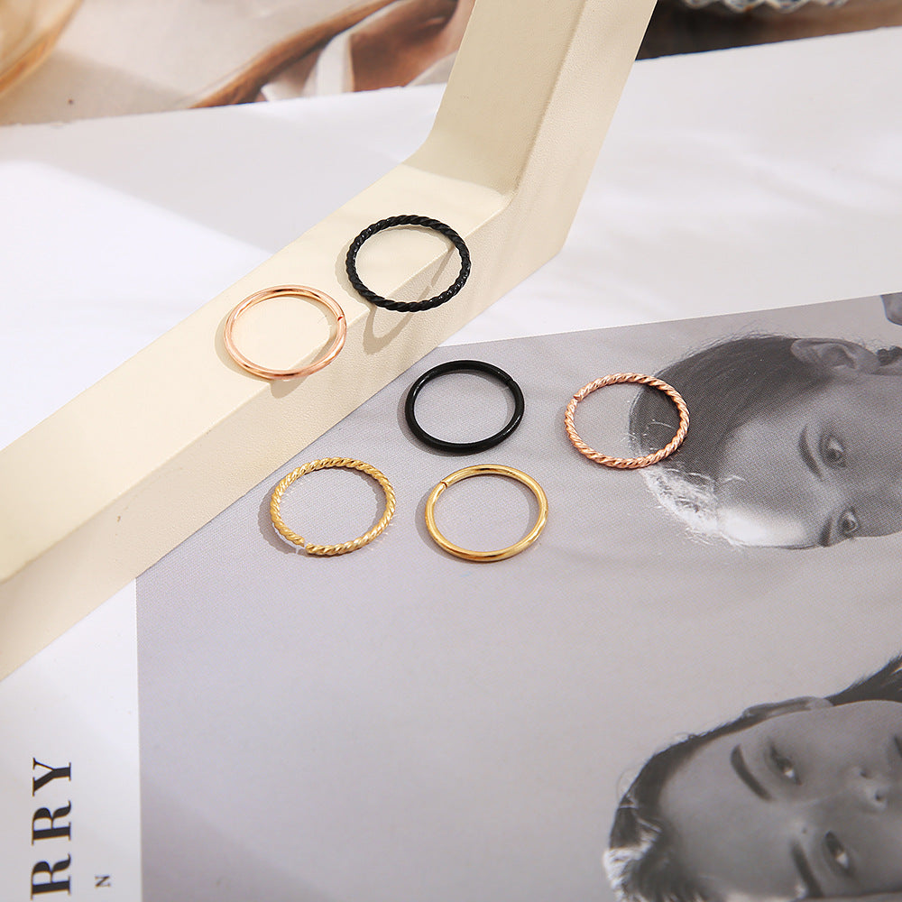 Nose studs, gold and black rings, 6 pieces