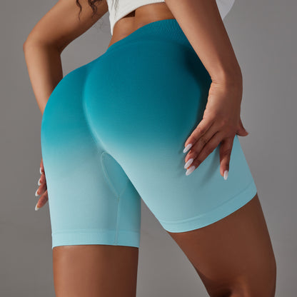 Pantalones cortos deportivos de cintura alta y levantamiento de glúteos color melocotón con forma de gradiente de alta elasticidad 