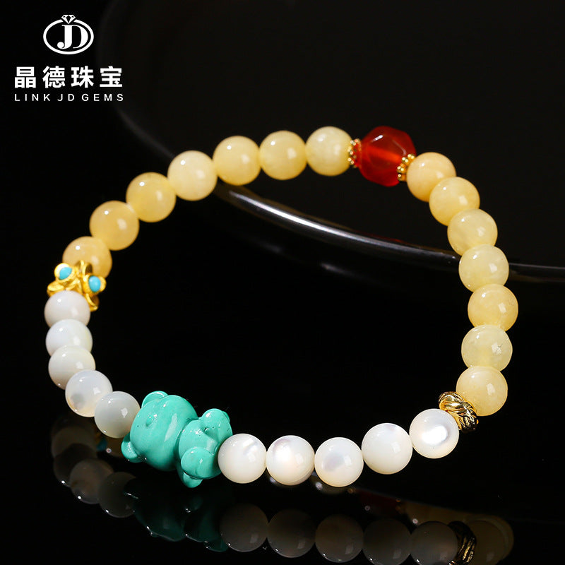 Natural white pearl shell rice topaz mixed bracelet.