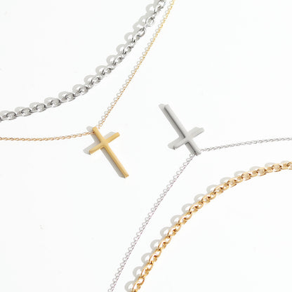 Cross pendant stacked with titanium steel necklace