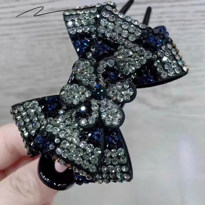 Accesorio para el cabello con pinza de tres dientes y diseño de mariposa con estampado de leopardo 