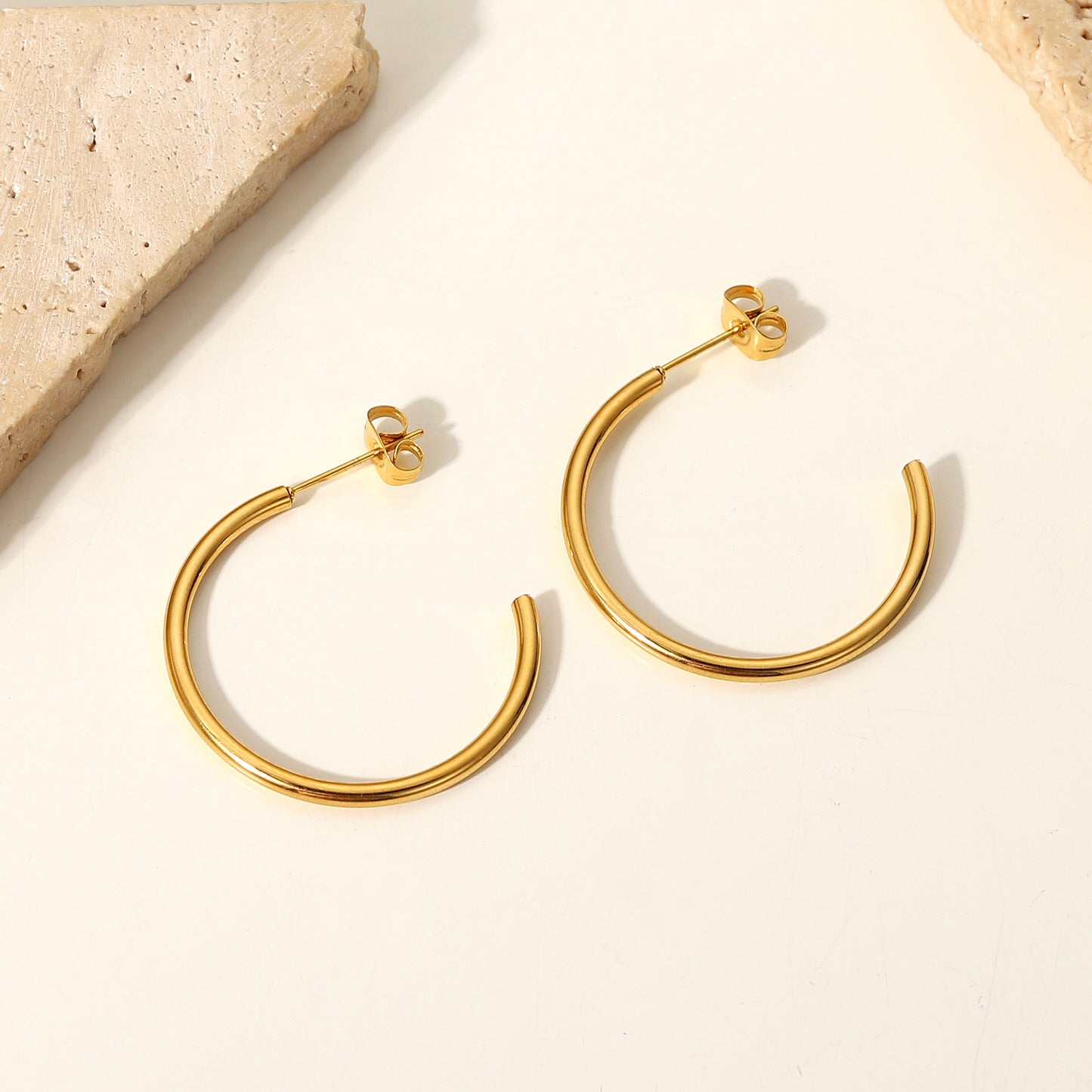 C-shaped titanium steel earrings