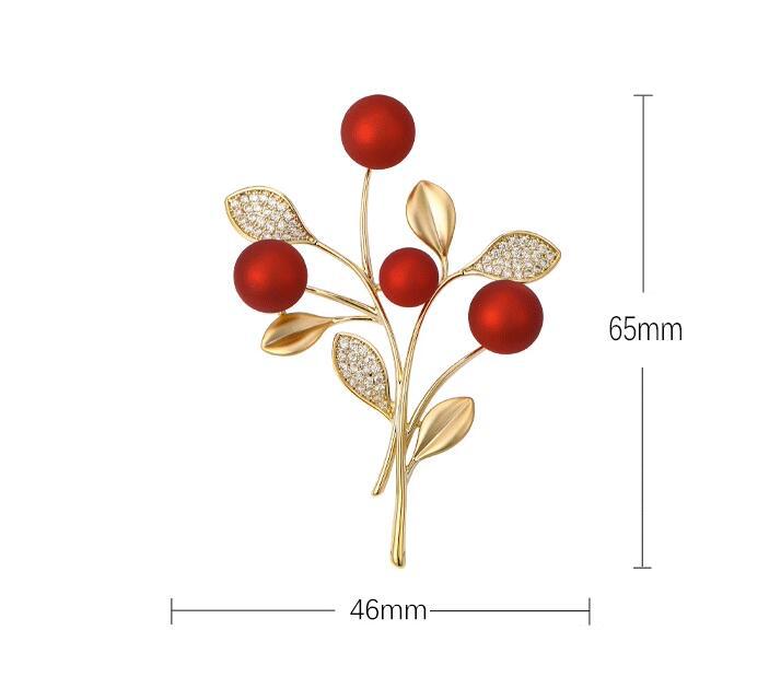 Red festive brooch