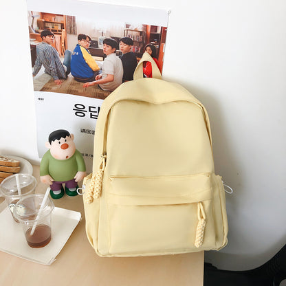 Solid color schoolbag women's simple backpack