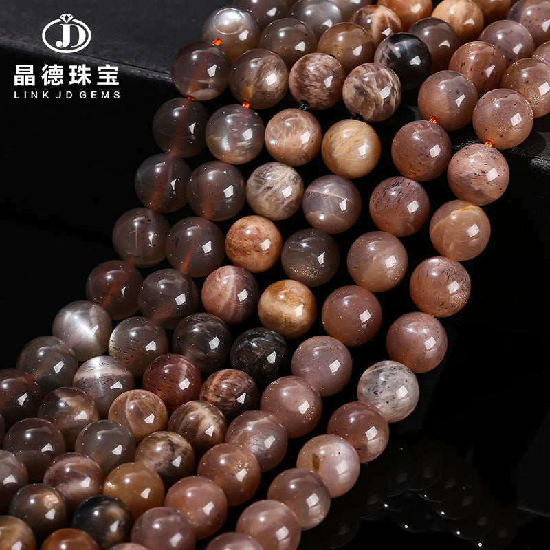 5A natural black backbone sunstone round beads